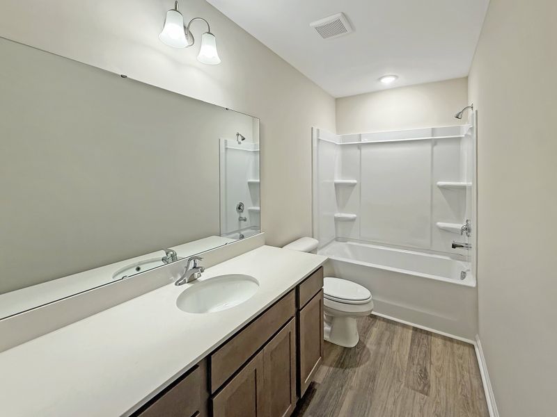 Furnished interior view inside a new home in The Village at Sassafras, Allenhurst (Image 9).