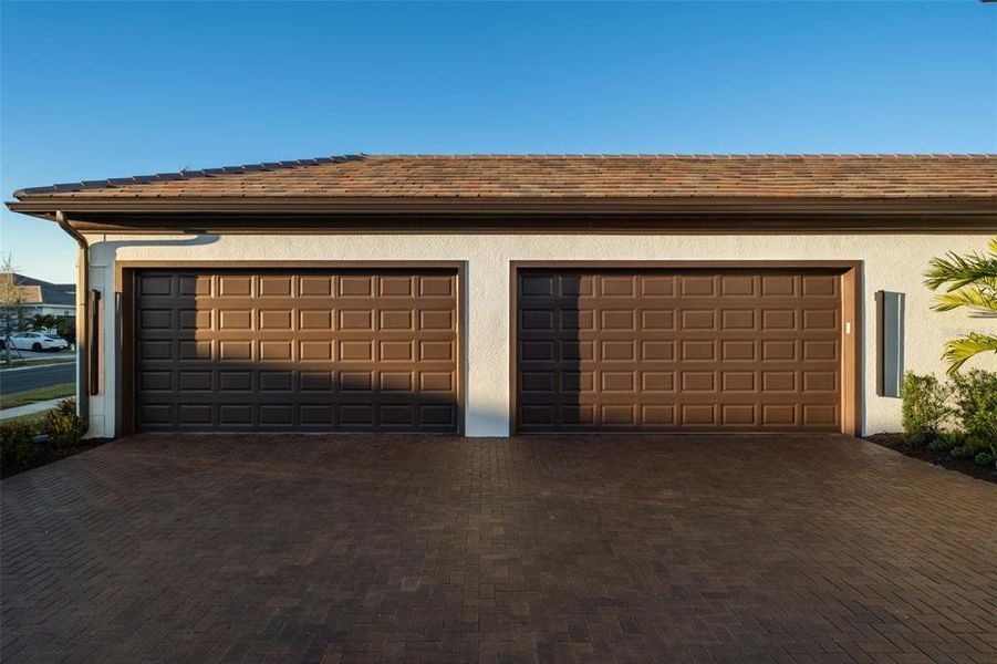 Front exterior of a new home in , Sarasota, FL, highlighting curb appeal (Image 33).
