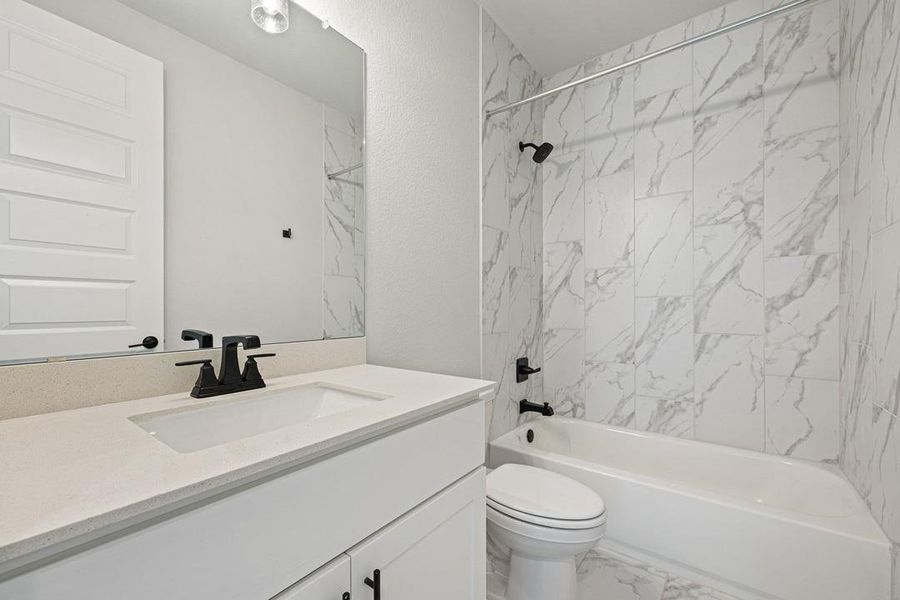 Furnished interior view inside a new home in Heritage, Dripping Springs (Image 13).