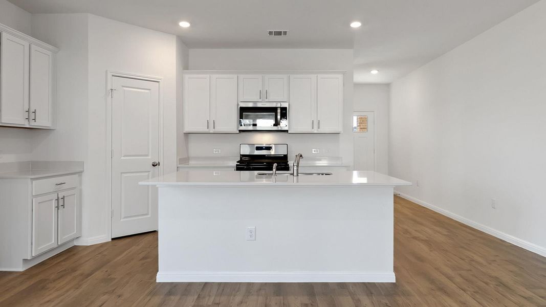 Furnished interior view inside a new home in Bar W Ranch, Leander (Image 6).