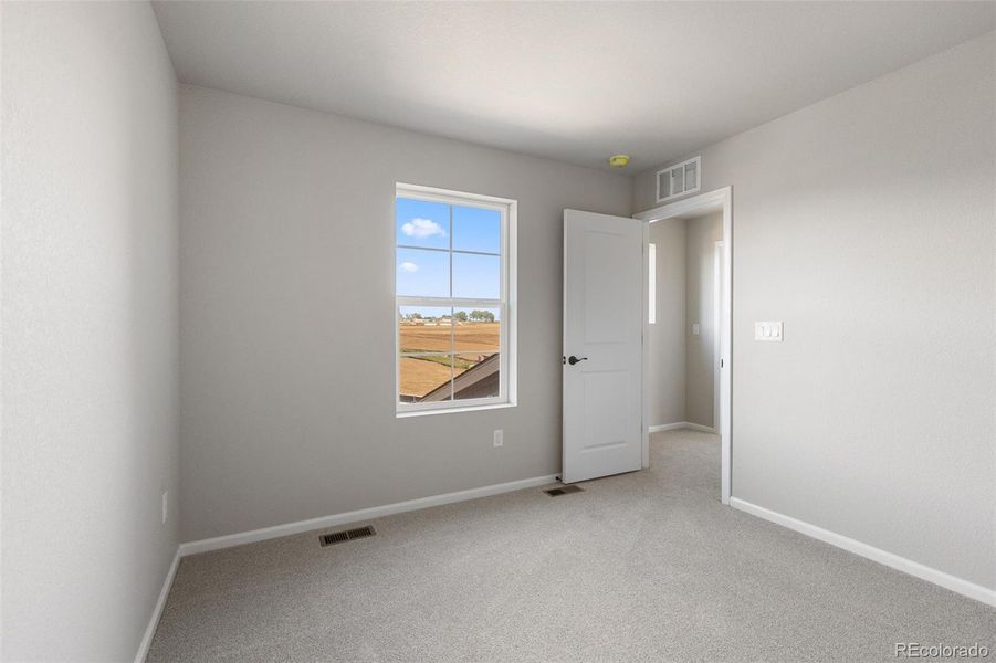 Spacious, unfurnished interior of a new home in The Legacy Collection at Talon Pointe, Thornton (Image 20).