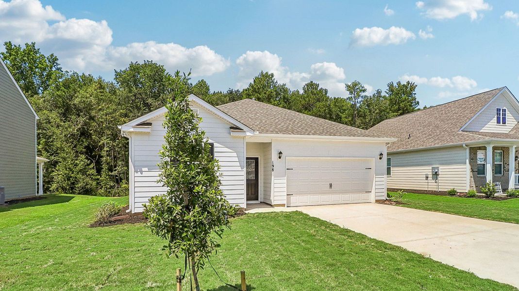 Front exterior of a new home in Sease's Pond, Gilbert, SC, highlighting curb appeal (Image 17).