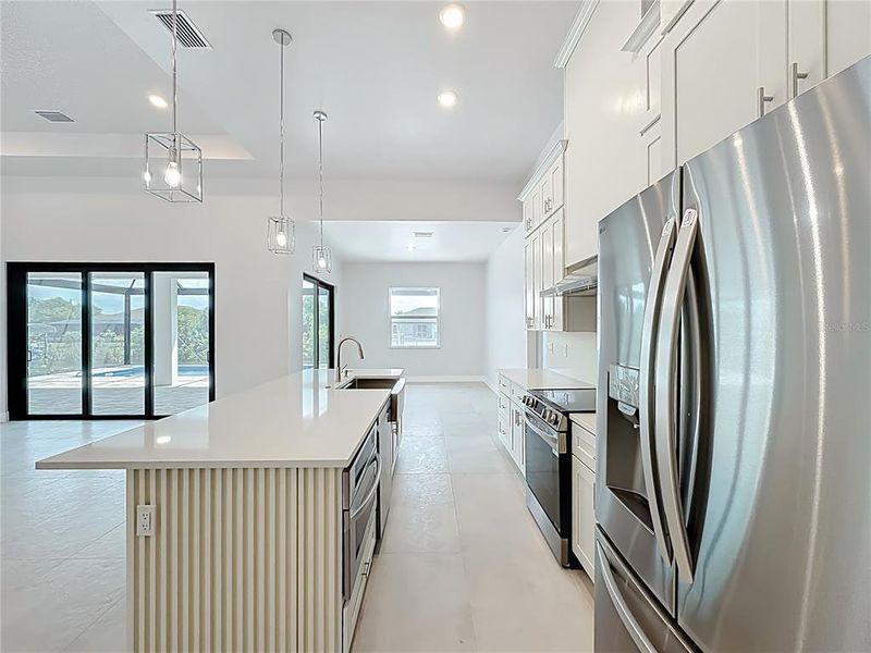 Furnished interior view inside a new home in , Port Charlotte (Image 11).