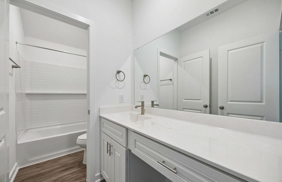 Furnished interior view inside a new home in Ellerden, Tomball (Image 10).