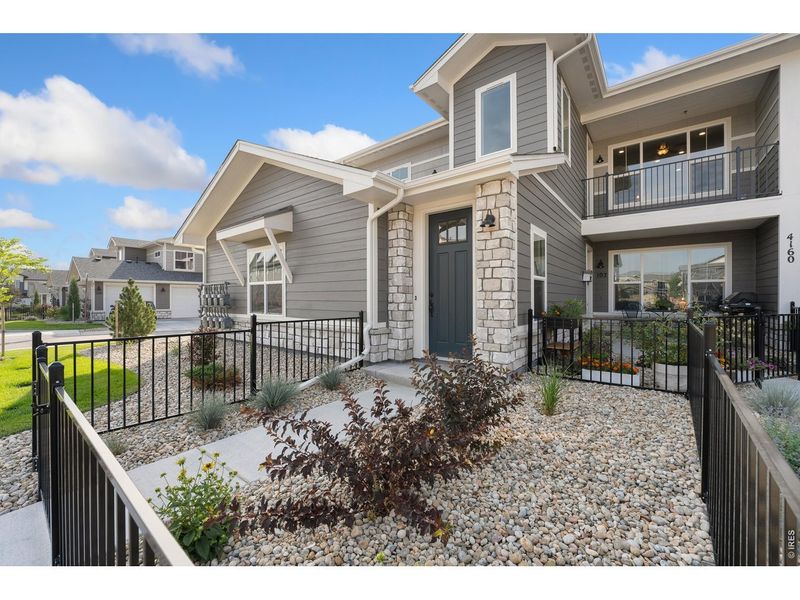Exterior details and patio area of a home in The Lakes at Centerra - Discovery, Loveland (Image 3).