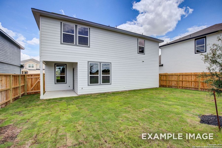 Front exterior of a new home in Hickory Ridge, Elmendorf, TX, highlighting curb appeal (Image 20).