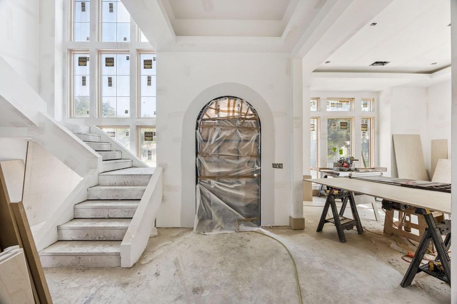 Stunning Foyer with ceiling detail.