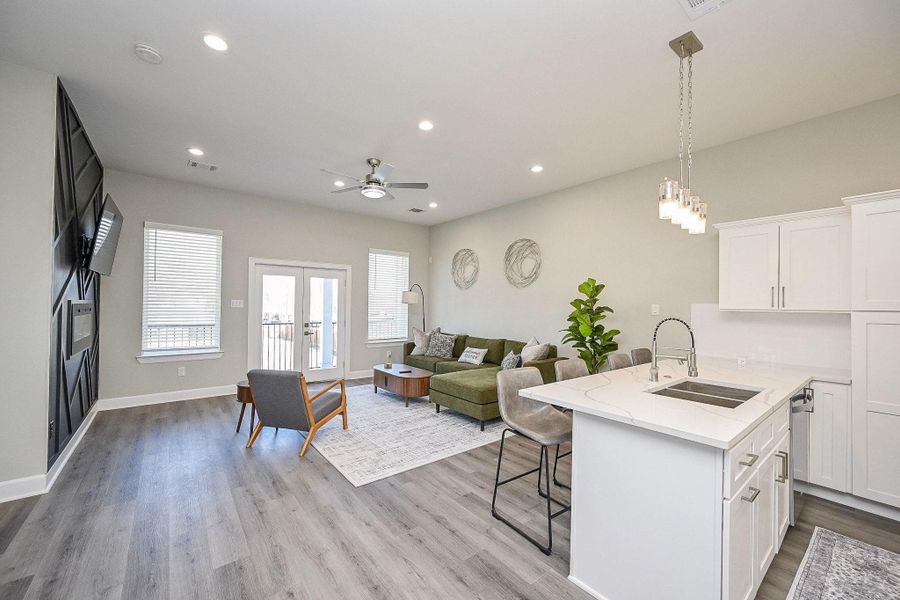 Bright and airy living room with modern finishes and an open, welcoming layout.