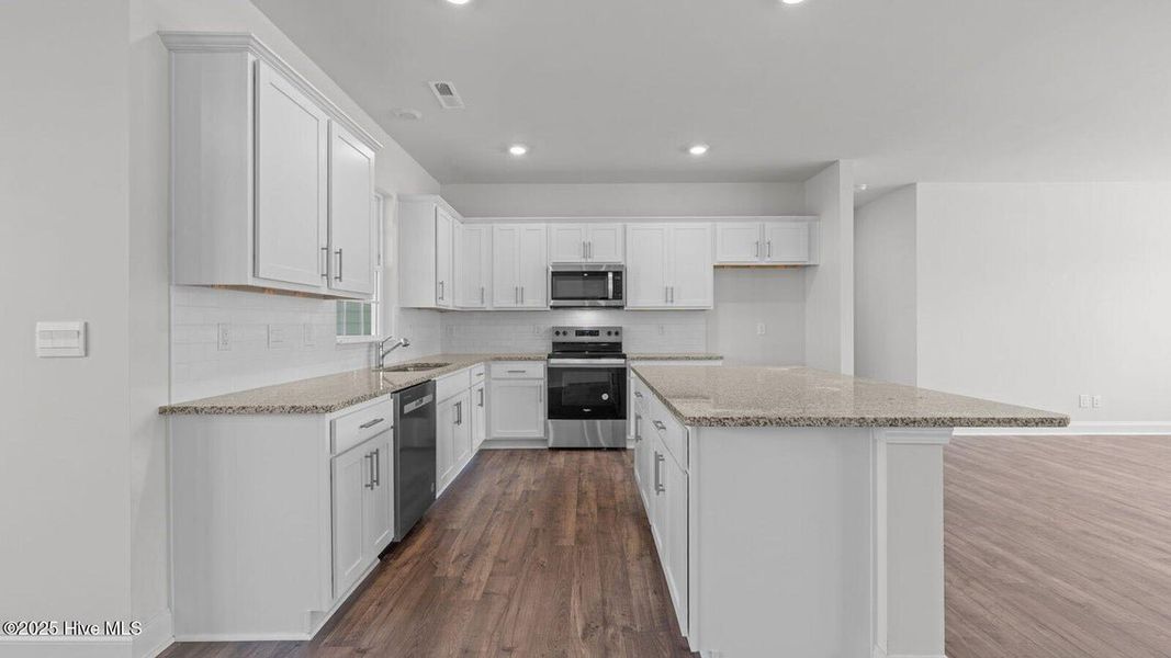 Furnished interior view inside a new home in Tyler - Home on the Lake, New Bern (Image 5).