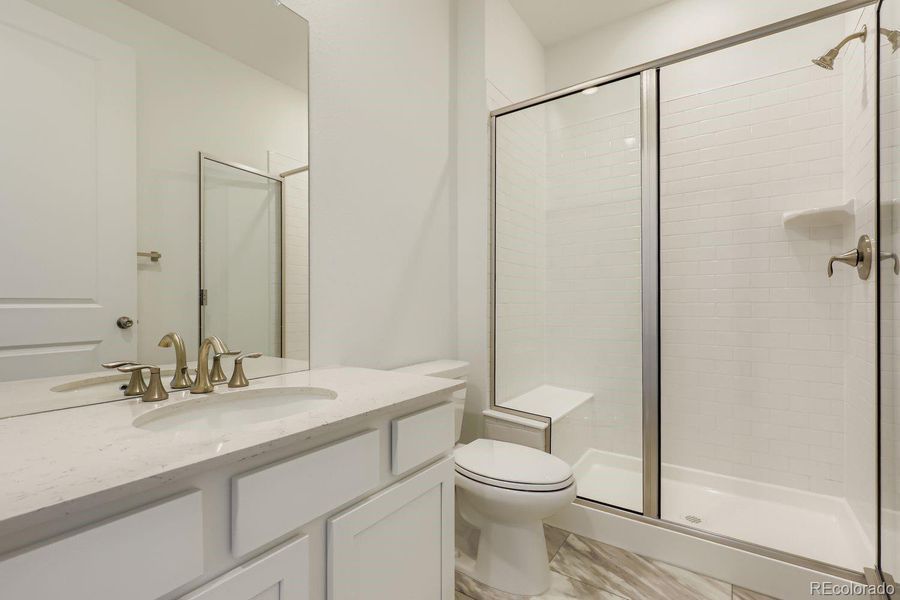 Furnished interior in a model home at Brighton Crossings: The Grand Collection in Brighton (Image 8).