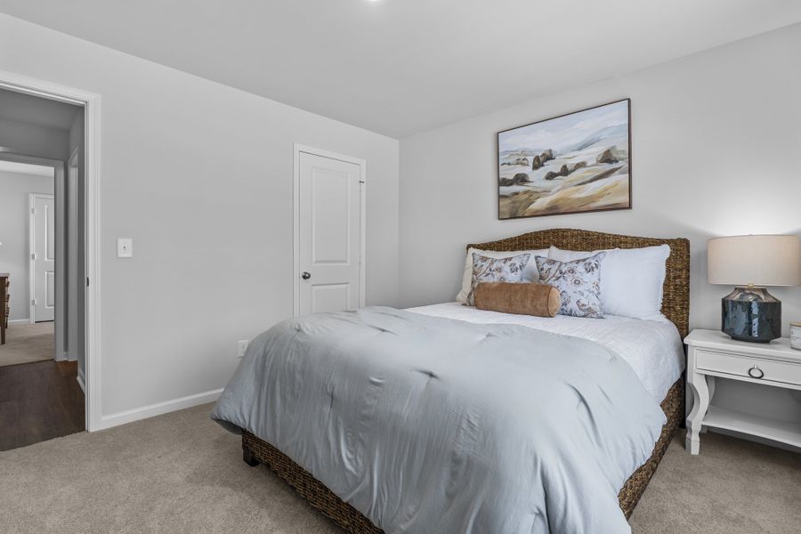 Representative furnished interior of a home built from the Magnolia by McGuinn Homes in Crystal Downs, Sumter (Image 29).