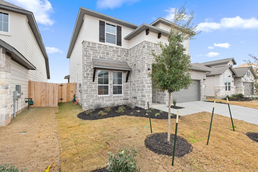 Exterior details and patio area of a home in Lagos Reserve, Manor (Image 3). Exterior details and patio area of a home in Lagos Reserve, Manor (Image 3).
