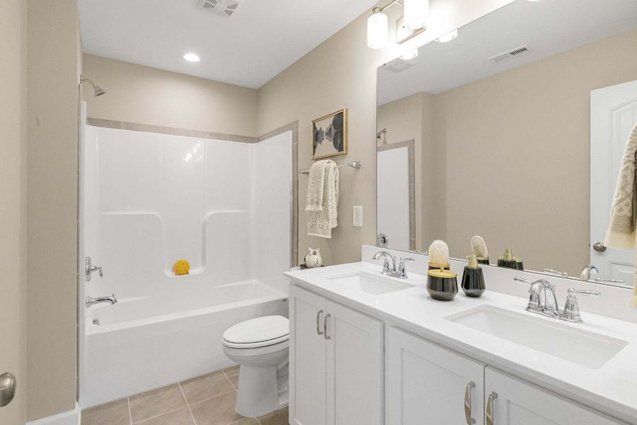 Representative furnished interior of a home built from the Aberdeen by Caviness & Cates Communities in Bartlett Manor, Youngsville (Image 199).