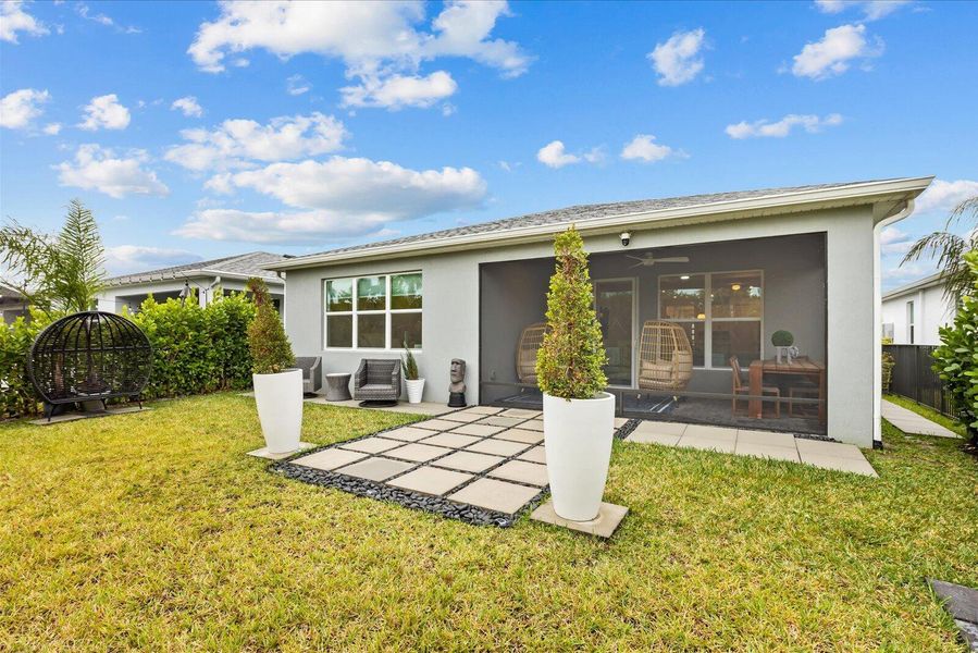 Exterior details and patio area of a home in Tradition - Kenley, Port St. Lucie (Image 3). Exterior details and patio area of a home in Tradition - Kenley, Port St. Lucie (Image 3).