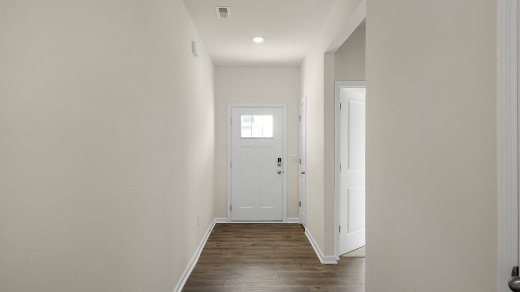 Spacious, unfurnished interior of a new home in The Grove at Matthews Landing, Fuquay Varina (Image 9).