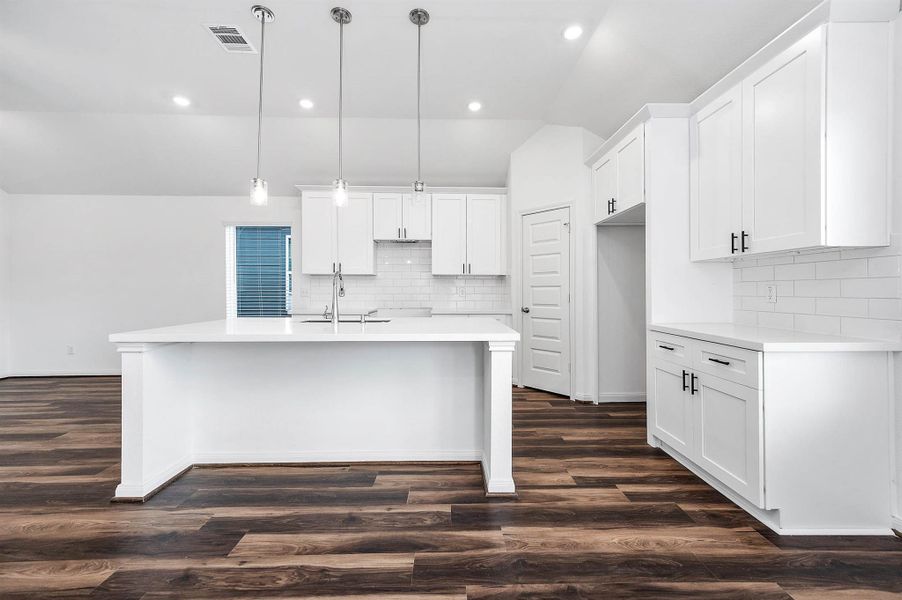 The kitchen exudes sleek sophistication with the modern clean finishes. The kitchen exudes sleek sophistication with the modern clean finishes.