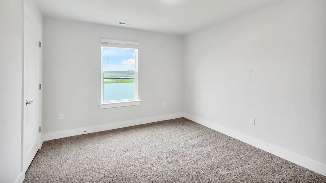 Spacious, unfurnished interior of a new home in The Landing at Sidbury Station, Castle Hayne (Image 25).