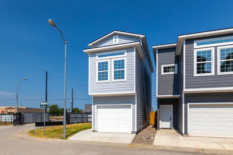 Front exterior of a new home in , Spring, TX, highlighting curb appeal (Image 24).