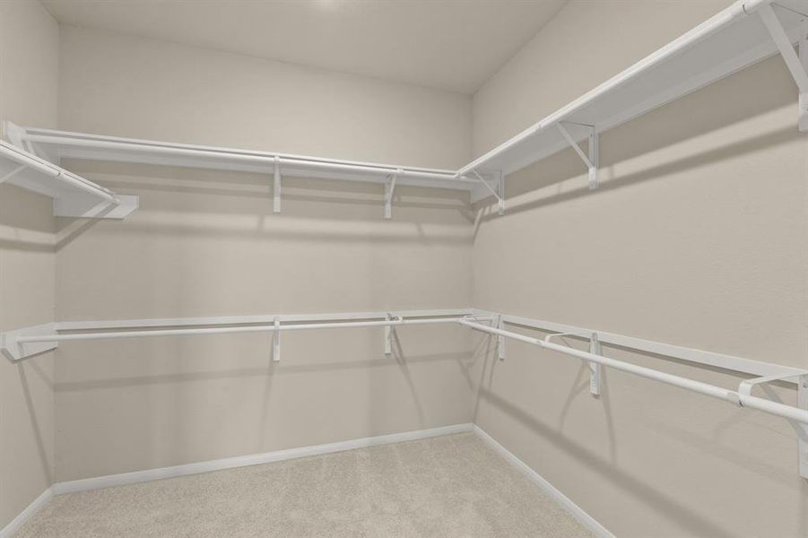 A view of your large primary walk-in Closet