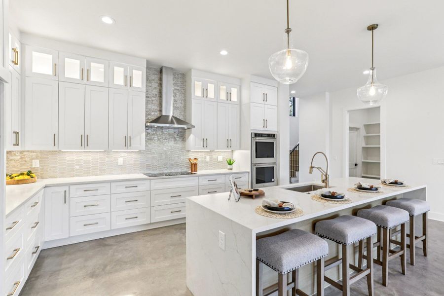High-end cabinetry provides ample storage and a custom, polished look