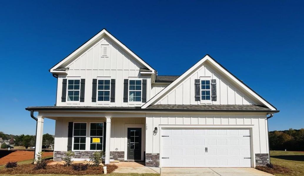 Front exterior of a new home in Sutton's Landing, Statham, GA, highlighting curb appeal (Image 2).