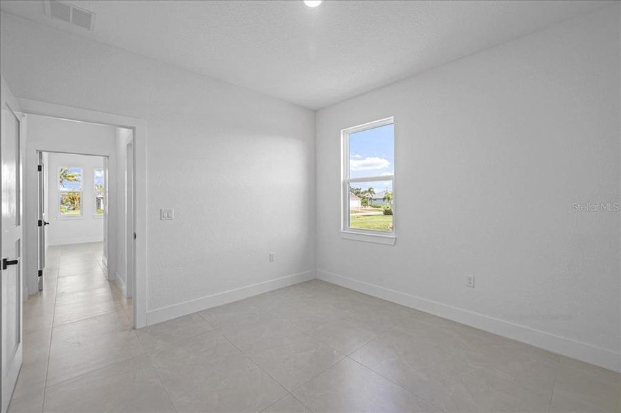 Spacious, unfurnished interior of a new home in , Port Charlotte (Image 33).