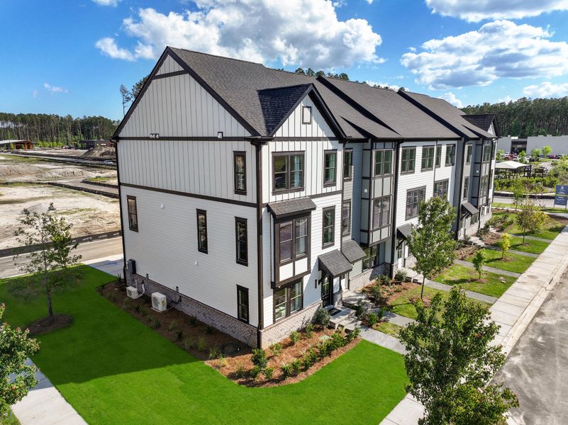 Front exterior of a new home in Nexton, Summerville, SC, highlighting curb appeal (Image 28). Front exterior of a new home in Nexton, Summerville, SC, highlighting curb appeal (Image 28).
