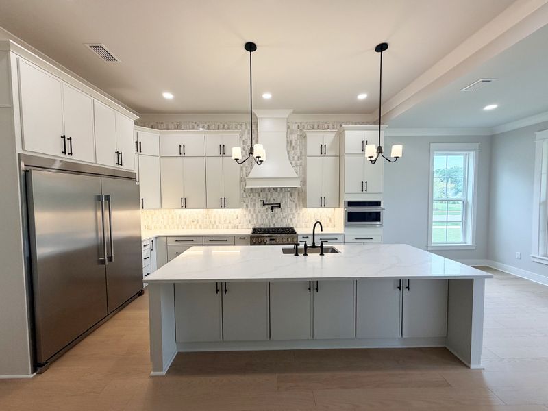 Furnished interior view inside a new home in Steamboat Landing at Hammock Bay, Freeport (Image 11).