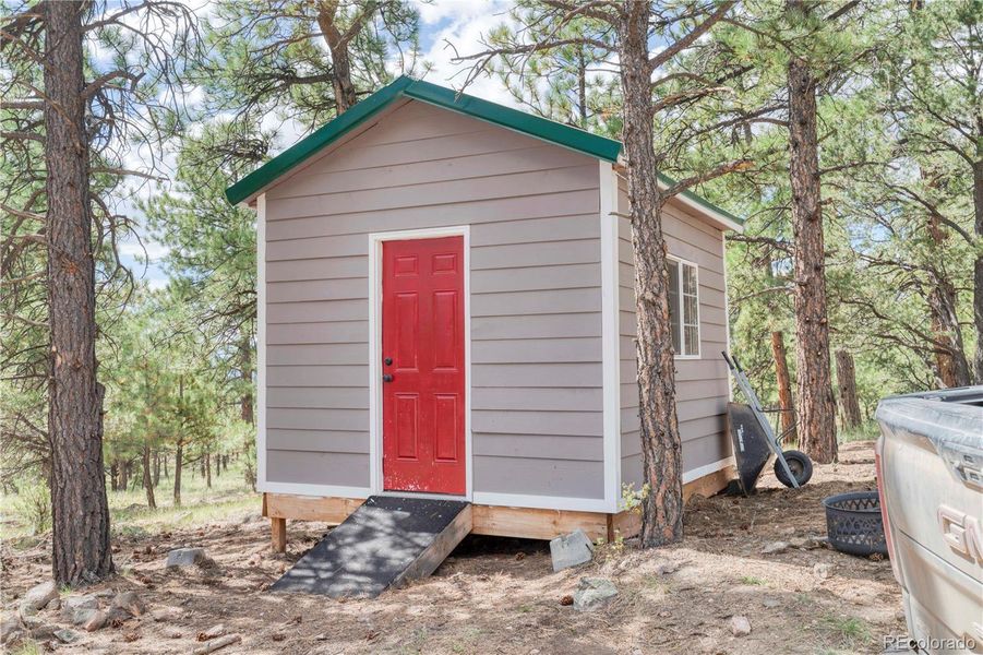 Front exterior of a new home in , Westcliffe, CO, highlighting curb appeal (Image 29).