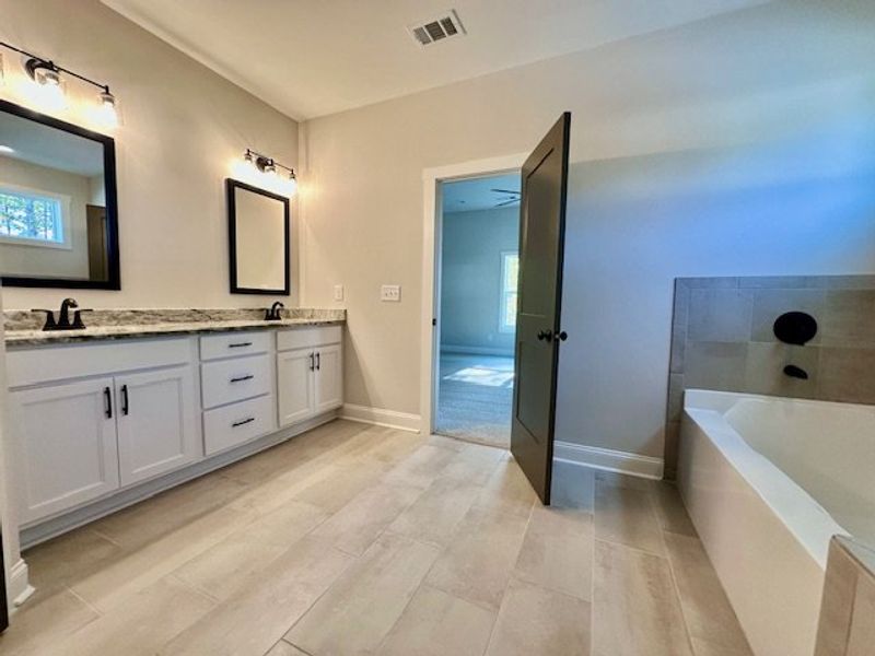 Furnished interior view inside a new home in Deer Creek, Moreland (Image 7).