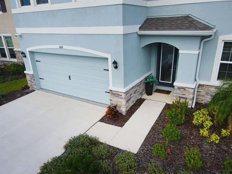 Front exterior of a new home in Solera at Lakewood Ranch, Lakewood Ranch, FL, highlighting curb appeal (Image 23).