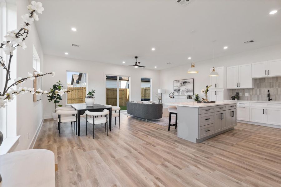 The first floor offers a huge living area, providing plenty of space for family gatherings, entertaining, or everyday life. Its open layout ensures effortless flow between rooms while maintaining a cozy, inviting atmosphere. This expansive space makes it easy to imagine your life unfolding comfortably here.