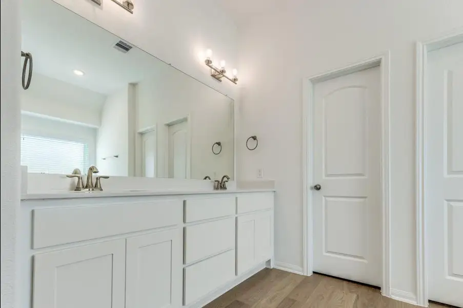 Furnished interior view inside a new home in Deer Pines, Conroe (Image 5).