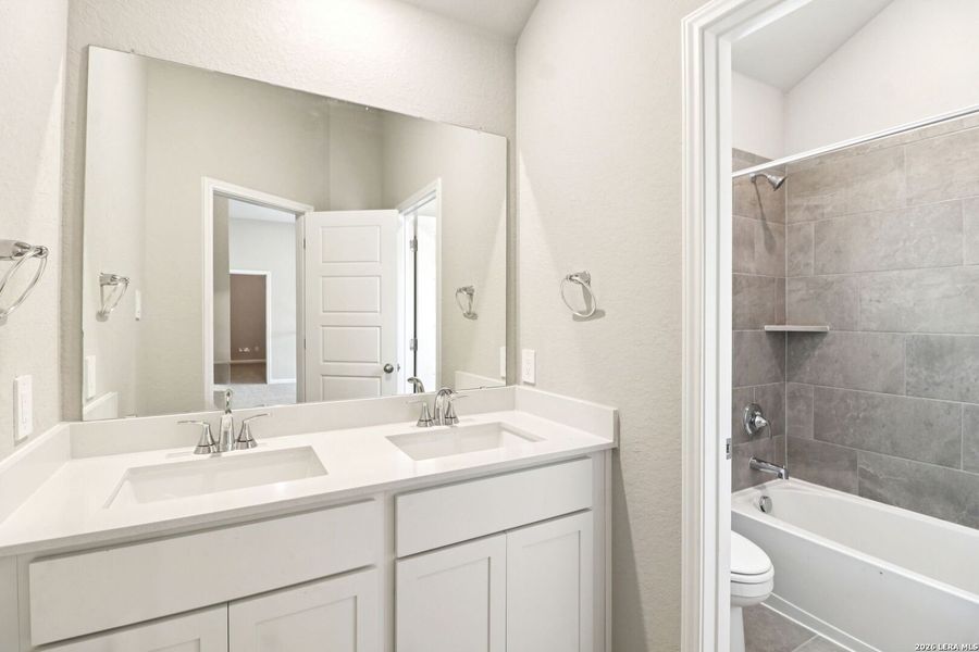 Furnished interior view inside a new home in Estancia Ranch - Classic Series, San Antonio (Image 7).