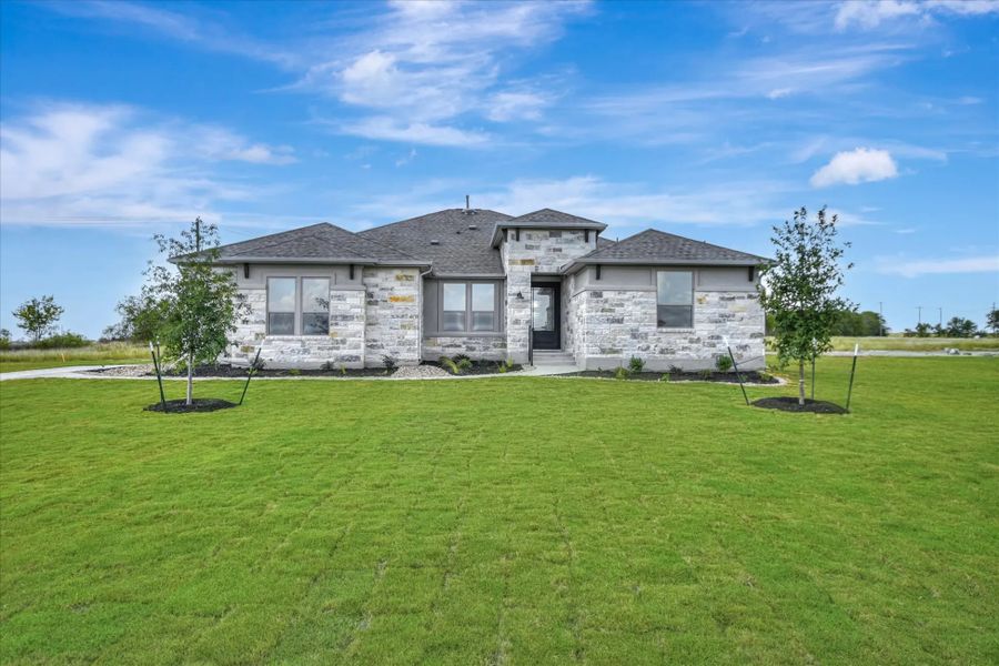 Representative exterior photo of a completed home built from the Bandera II by Giddens Homes in Leander Estates, Leander, TX (Image 7).