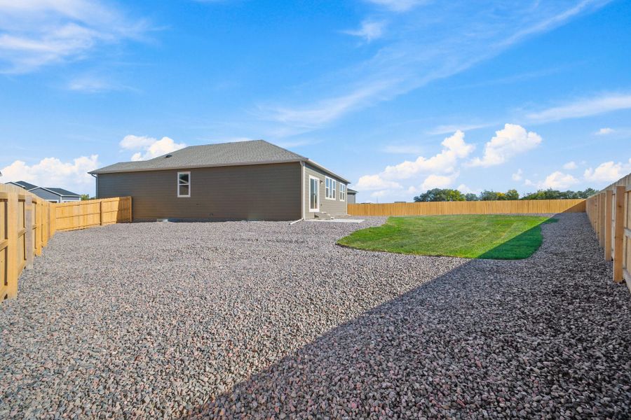 Exterior details and patio area of a home in The Glen, Colorado Springs (Image 22).