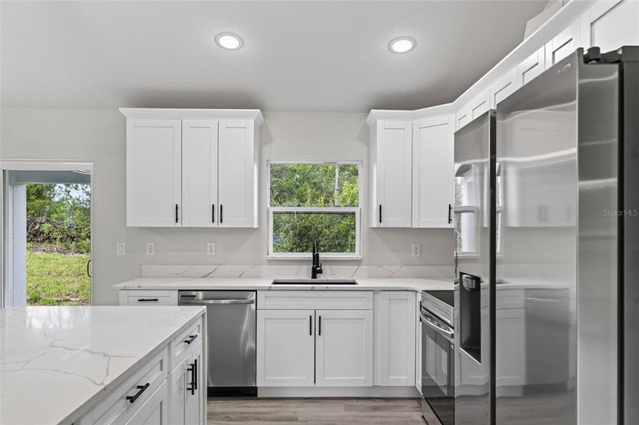 Furnished interior view inside a new home in , Dunnellon (Image 8).