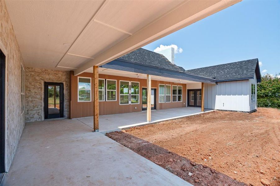 Front exterior of a new home in , Joshua, TX, highlighting curb appeal (Image 24).