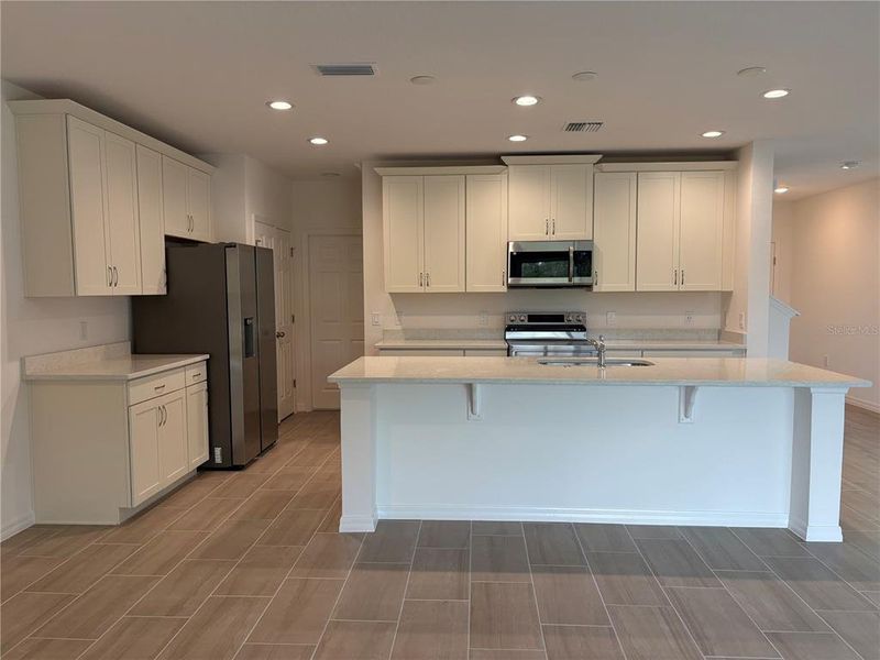 Furnished interior view inside a new home in Sky Lakes Towns, St. Cloud (Image 8).