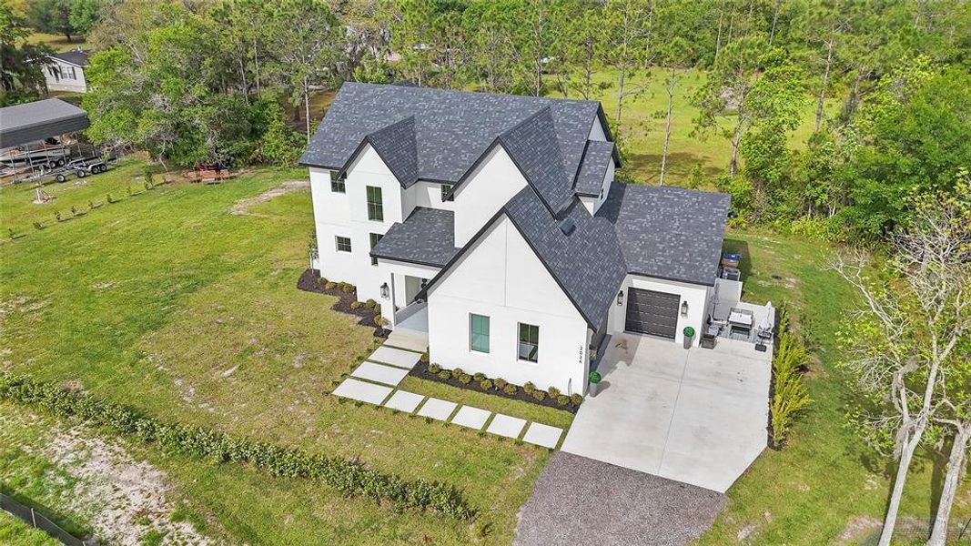 Front exterior of a new home in , St. Cloud, FL, highlighting curb appeal (Image 25).