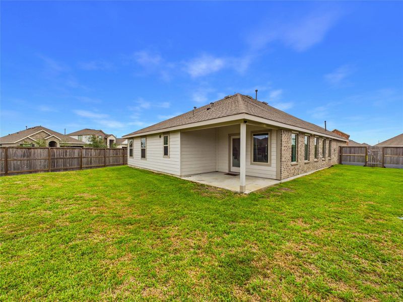 Exterior details and patio area of a home in Sterling Point at Baytown Crossings: Wildflower II Collection, Baytown (Image 22). Exterior details and patio area of a home in Sterling Point at Baytown Crossings: Wildflower II Collection, Baytown (Image 22).