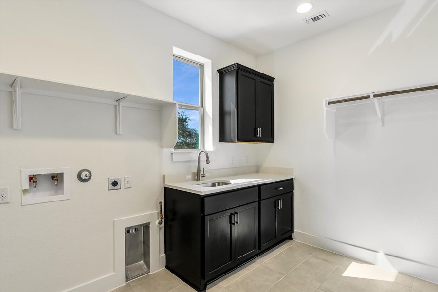 Furnished interior in a model home at Burnet Hilltop Estates in Cedar Park (Image 7).