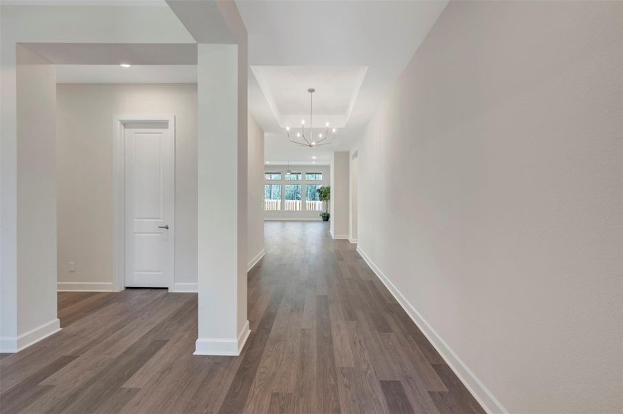 High ceilings & open entrace welcome you into this home