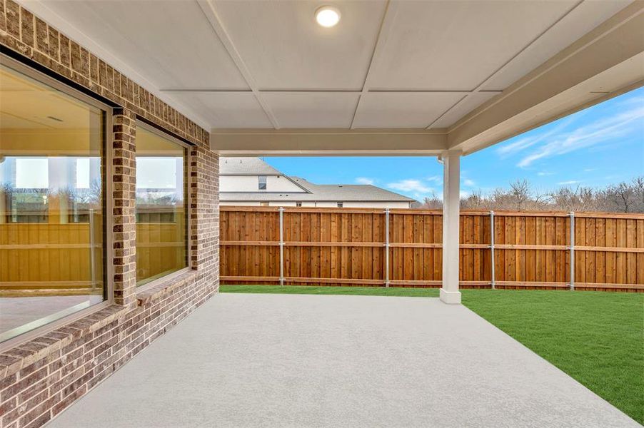 Exterior details and patio area of a home in Karis - Village Series, Crowley (Image 3).