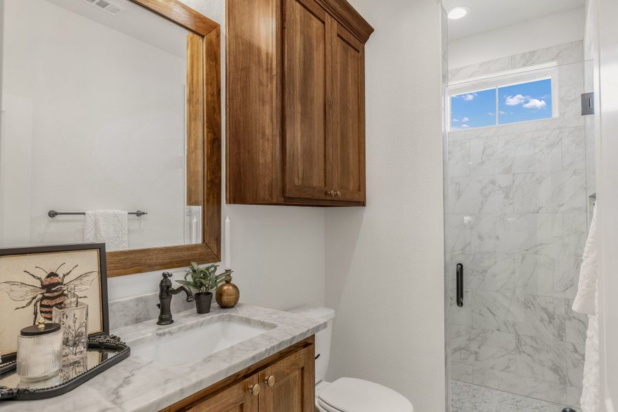Representative furnished interior of a home built from the The Grayson by Reece Homes in Stella Ranch, Bryan (Image 32).