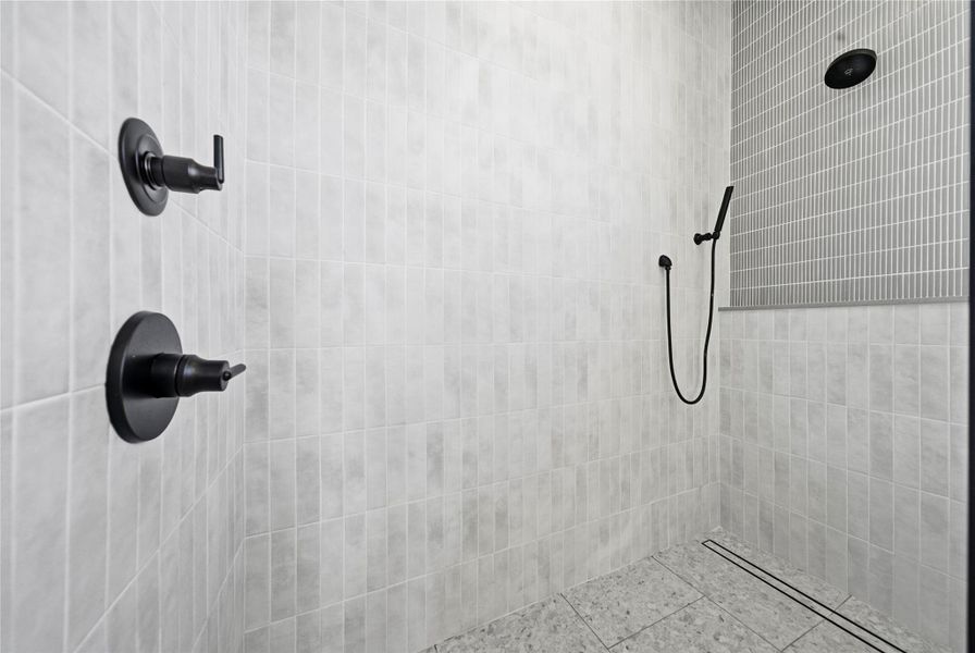 Bathroom with tiled shower