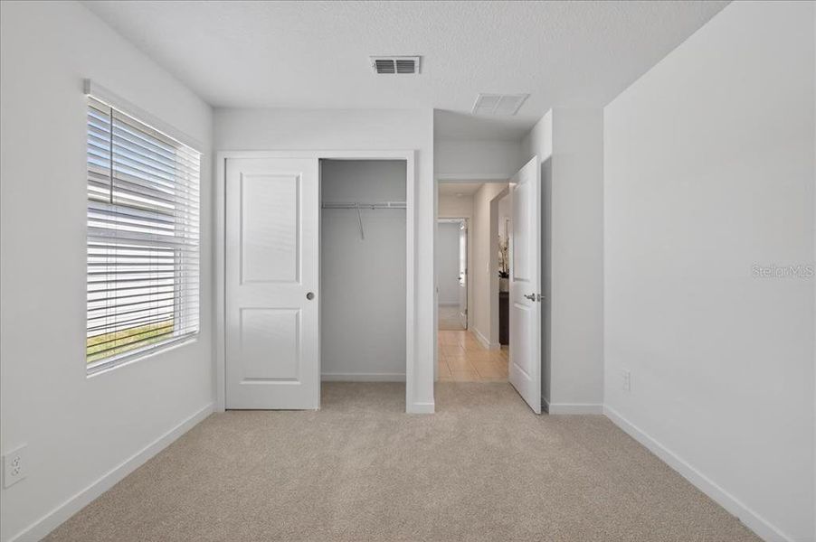 Spacious, unfurnished interior of a new home in Colbert Landings, Palm Coast (Image 20).