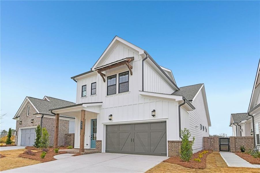 Front exterior of a new home in Aberdeen, Hoschton, GA, highlighting curb appeal (Image 14).