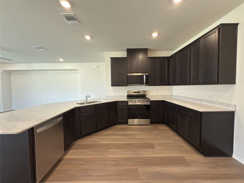 Furnished interior view inside a new home in River Bluff, Leander (Image 5). Furnished interior view inside a new home in River Bluff, Leander (Image 5).