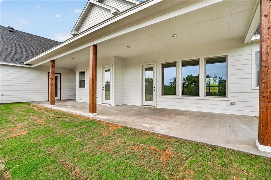 Exterior details and patio area of a home in , Poolville (Image 22).